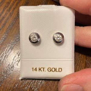 Really pretty, 14 KT white gold bezel set CZ earrings. Total 1 ct